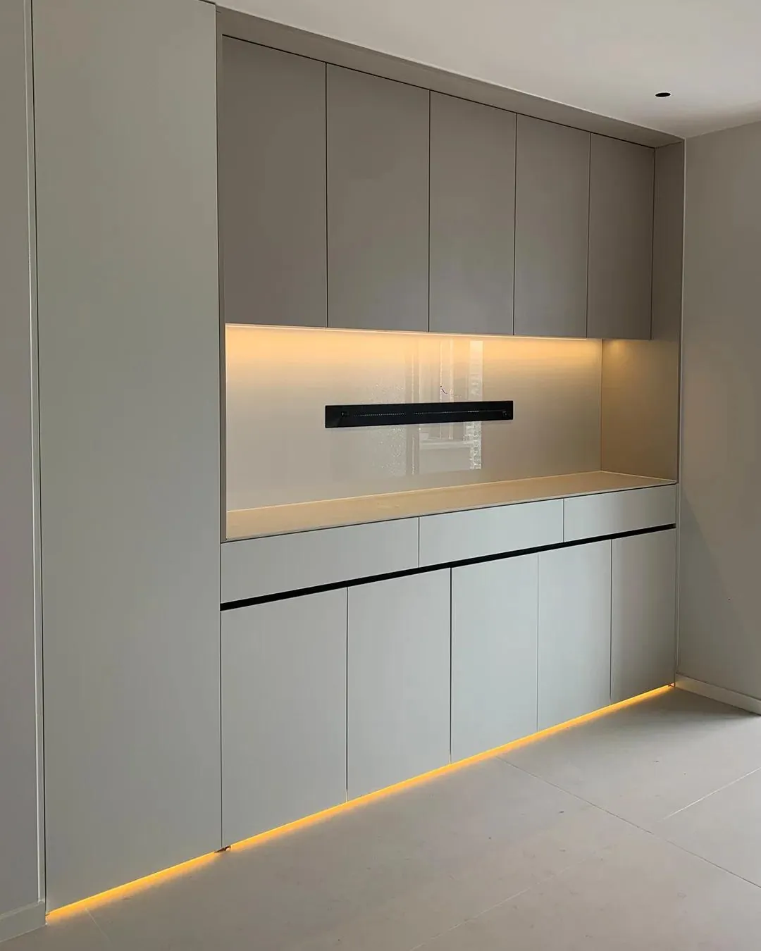 Wall panel and storage cabinet design for a Singapore living room